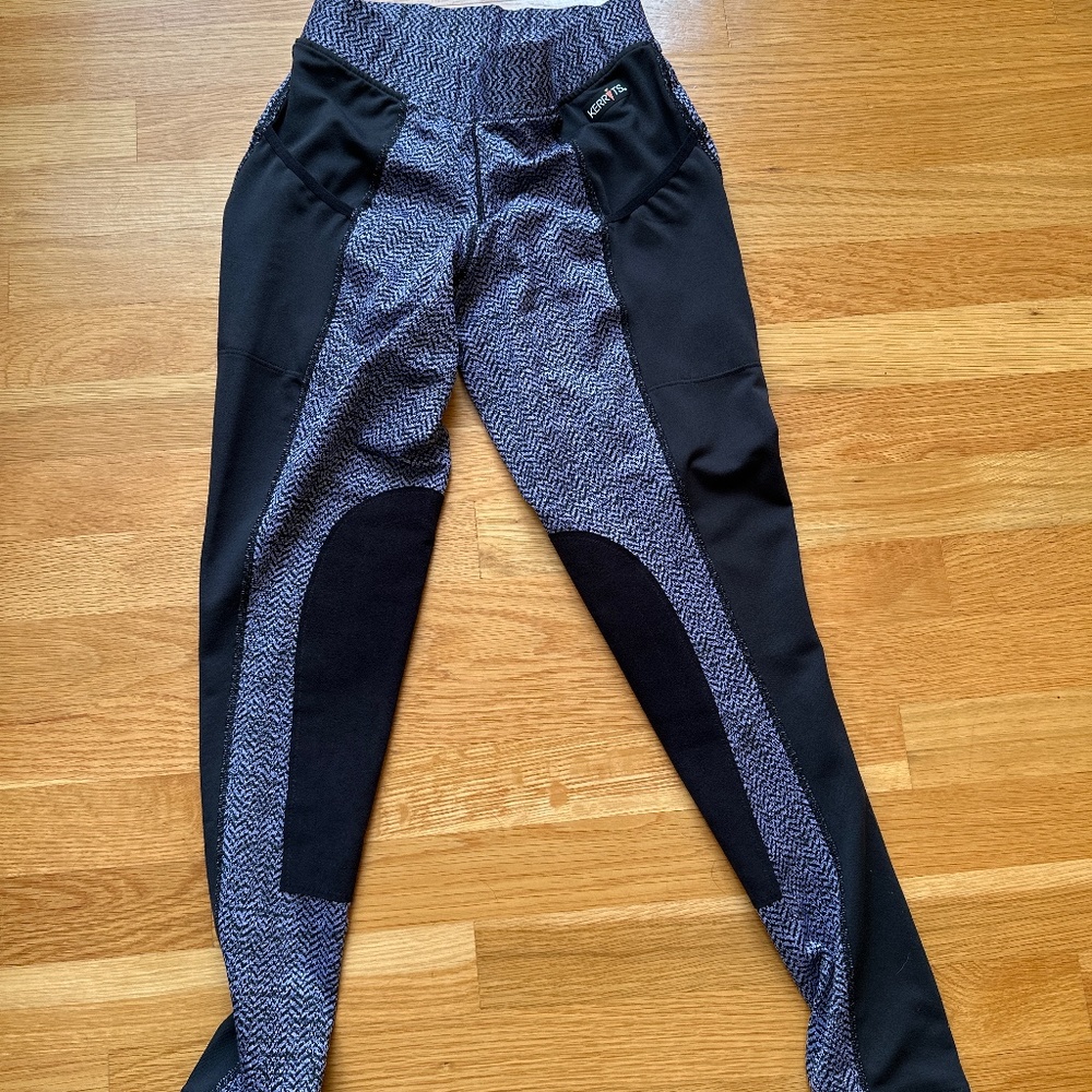 Three pairs of adult, size small horseback riding pants. Purple pair is new with